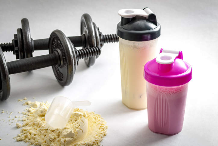 Workout Supplements: What Supplements Should I Take, dumbbells and protein shake bottle